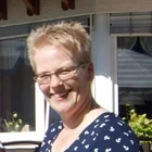 Porträt von Silvis Goeppinger, lächelt freundlich in die Kamera